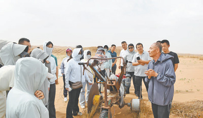 先鋒模范 | 唐希明：扎根一線34年，科學治沙百萬畝(圖1)